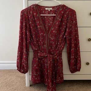 Red floral blouse